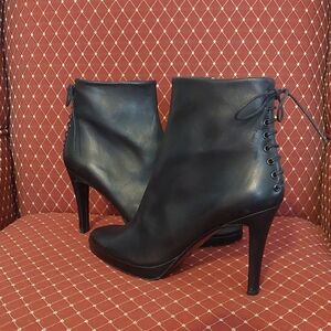 Sleek Black Lace-Up Heeled Boots